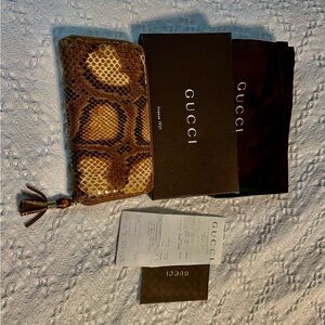 Gucci snakeskin wallet.